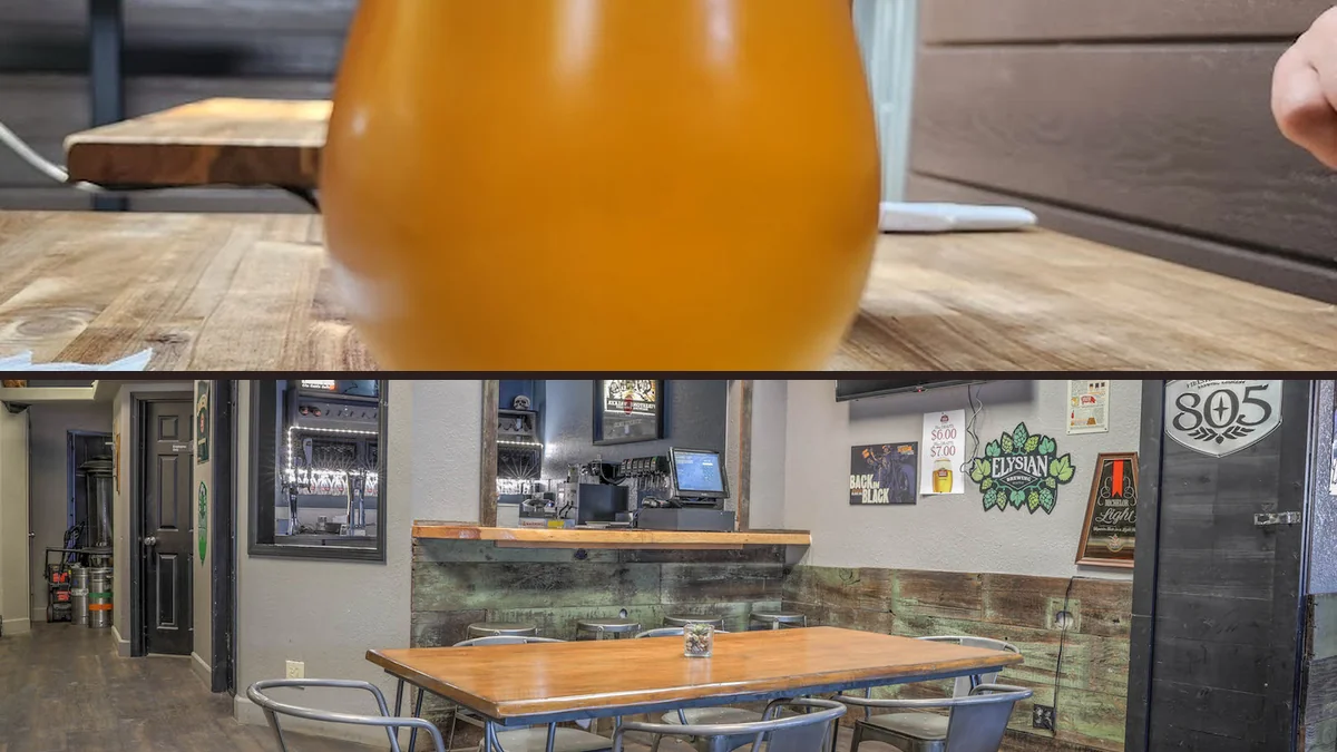 Casual dining room with bar seating and TVs.